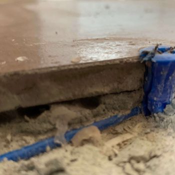 Screw damaging underfloor heating wire