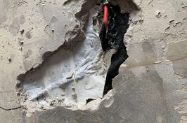 Underfloor heating repair with hole in concrete