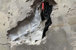 Under tile heating repair with hole in concrete